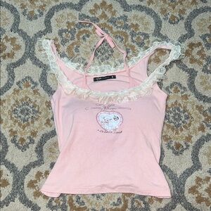 Light pink coquette sleeveless top with lace trim